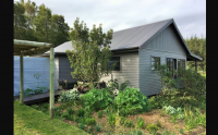  MyTravelution | Woodcutters Forest Cottages Main